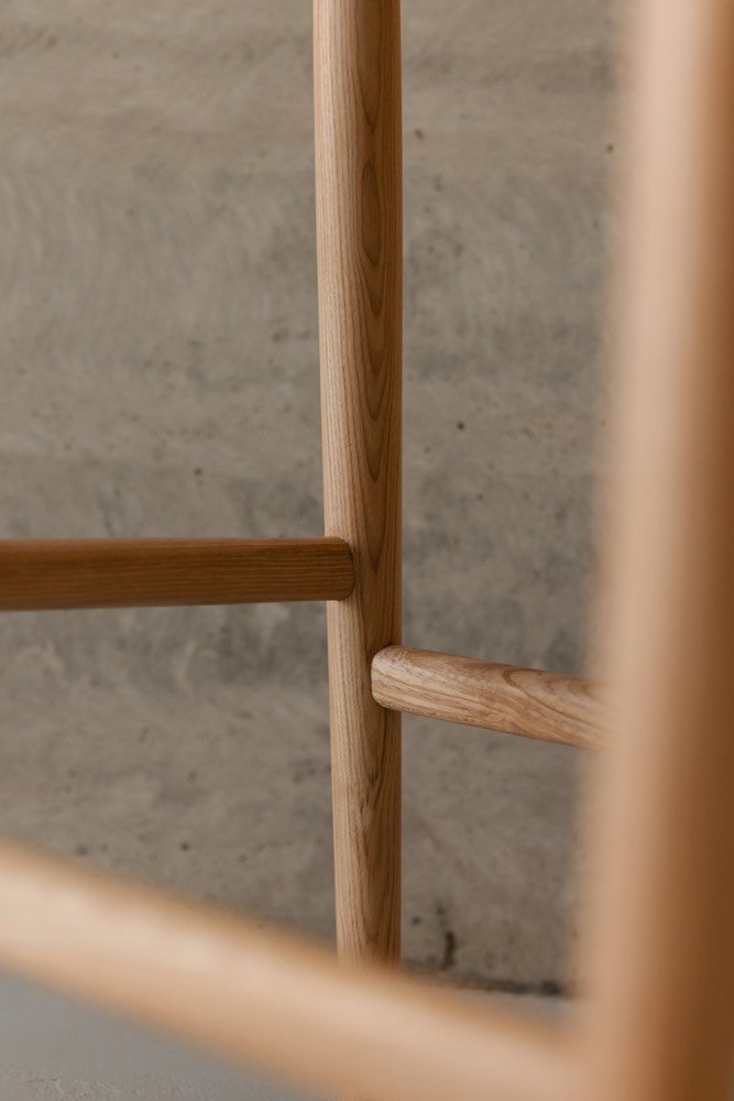Detail of the arm meeting the leg