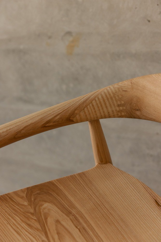 Backrest and arm detail in solid ash